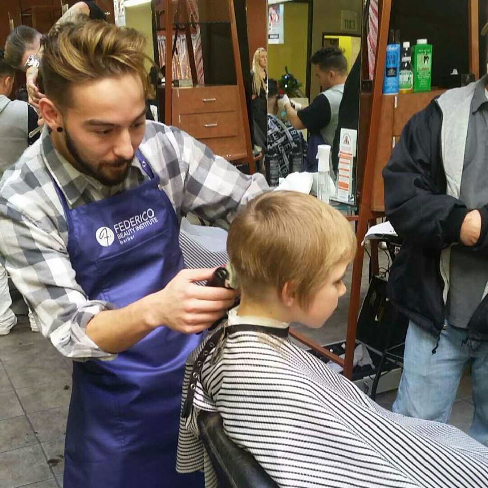 Child receiving a free haircut and a super cute hair style