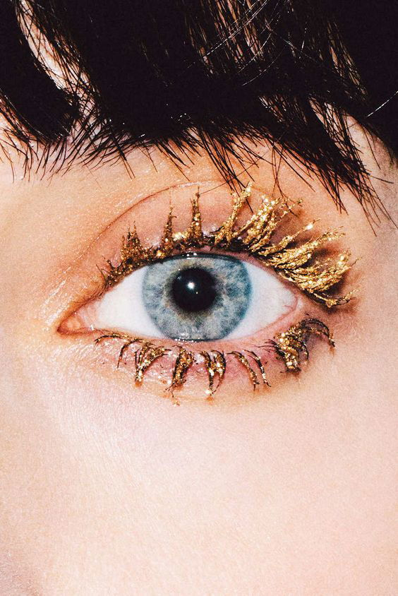 Glittery gold eyelashes