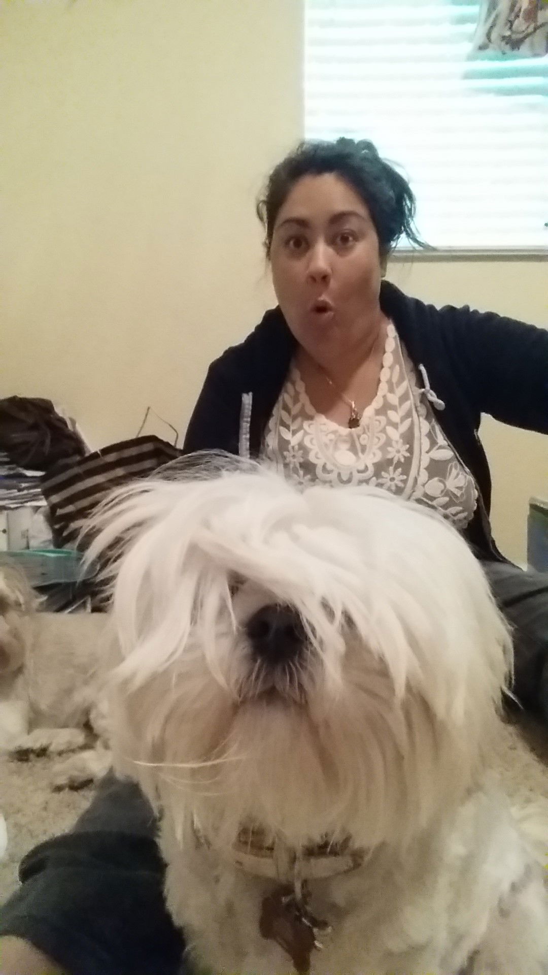 Ms. Tera, Educational Systems Manager with  her dog.