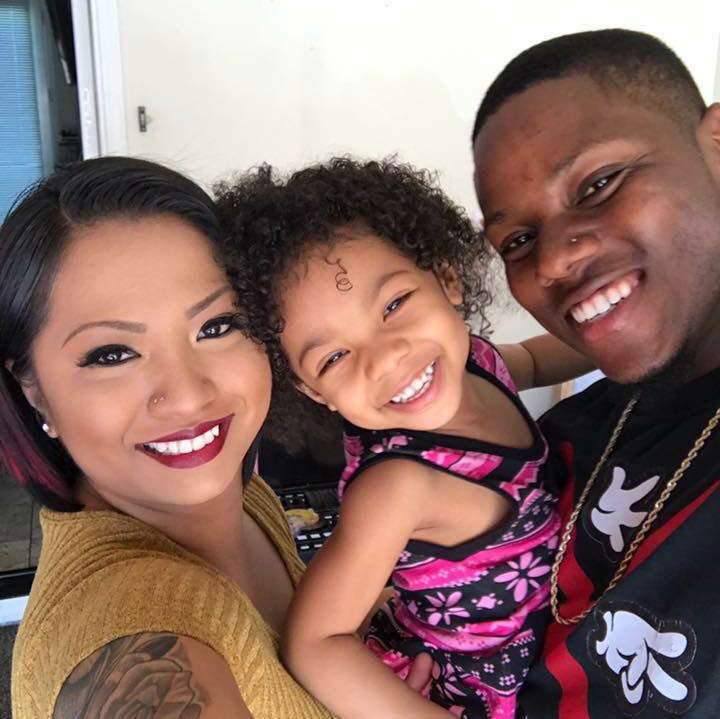 avier and Michelle White, the owners of XM Hair Studio with their child