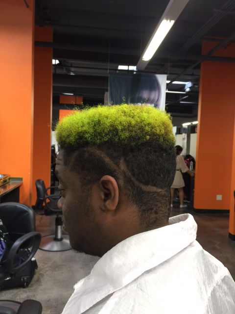 Neon lime hair on top.