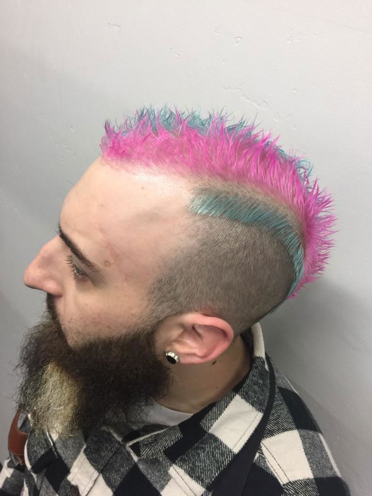 Pink and blue striped short mohawk.